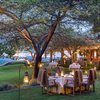 Charming outdoor setup at Singita Sasakwa Camp in Tanzania