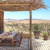 Outside dining set up with view of Laikipia wilderness at Lengishu