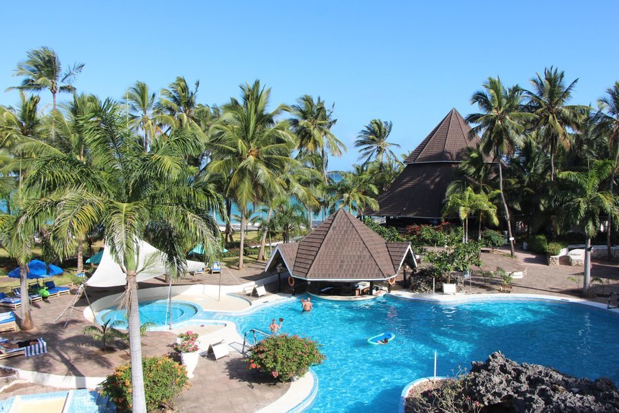 A glance at the pool area and Beach at Diani Reef Beach Resort