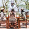 Outdoor dining setup with views of the lake at Sarova Lion Hill