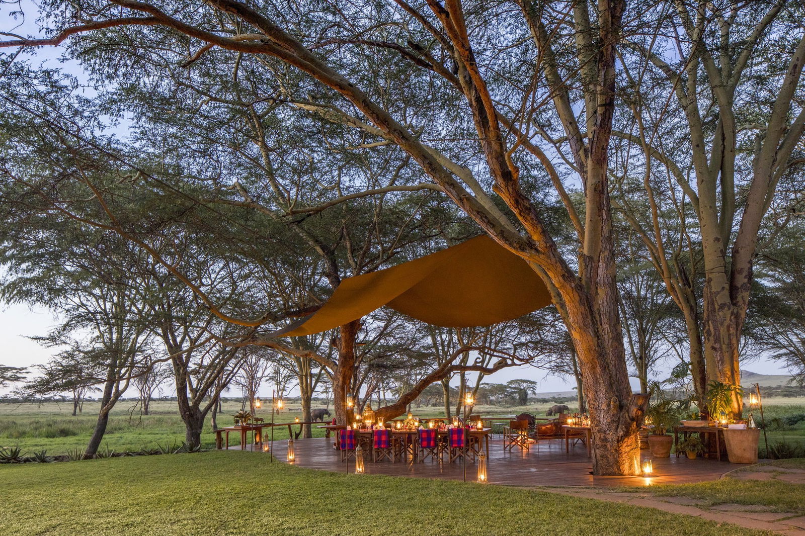 Outside dining setup on a deck at Sirikoi Lodge in Kenya