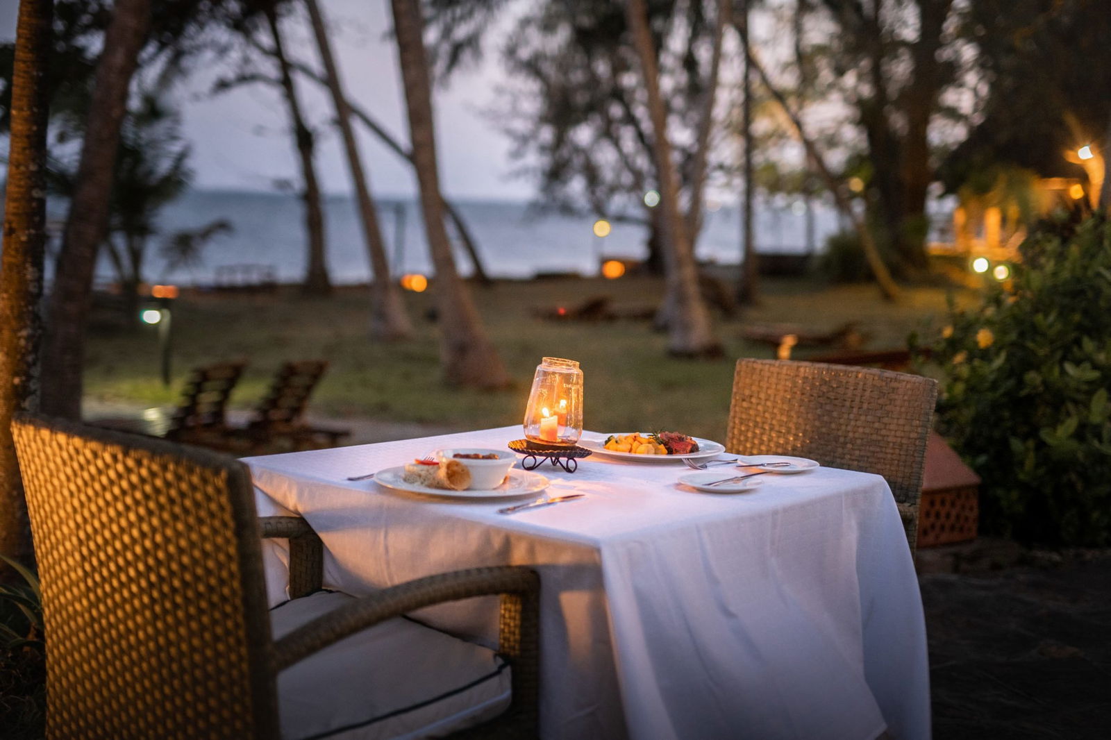 Outdoor dining setup with views of the Indian Ocean from Severin Sea Lodge