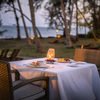 Outdoor dining setup with views of the Indian Ocean from Severin Sea Lodge