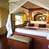 Inside one of Mara Intrepids Camp's tent with bed set up