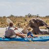 Kayaking in the wilderness spotting elephants at Ekorian's Mugie Camp