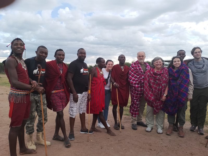 visiting the maasai people being led by our safari guides