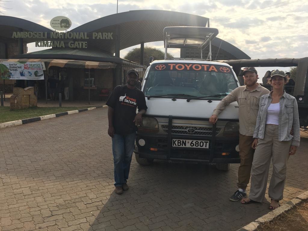A picture of our guest with our safari van
