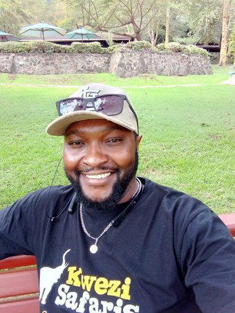 Kwezi Safaris Top Safari Guide