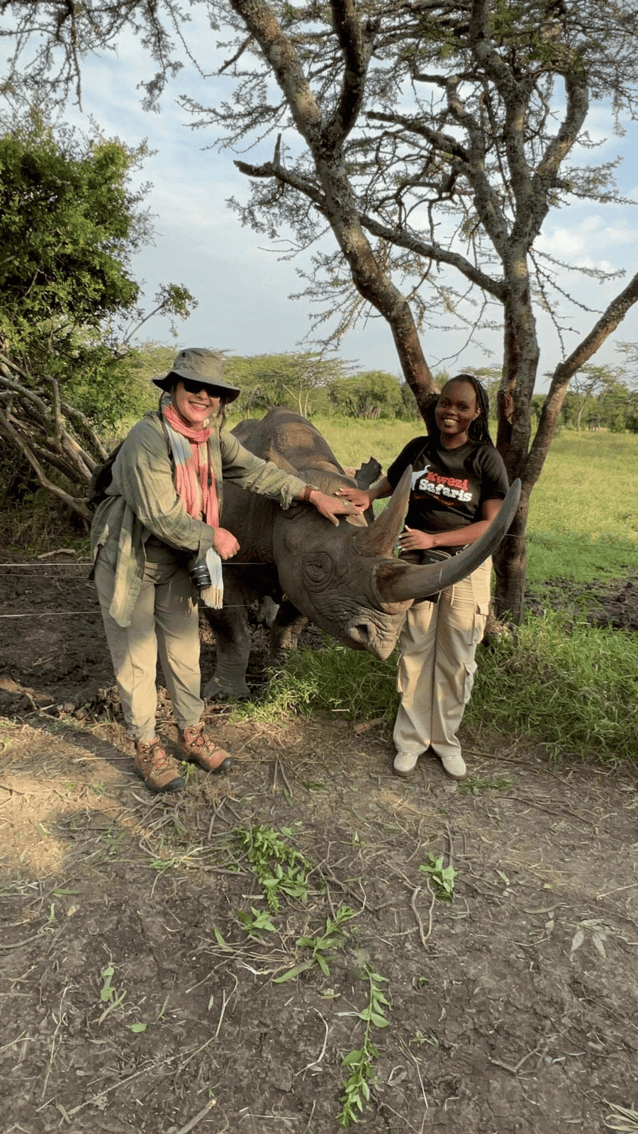 A traveler and Diana visiting the blind rhino in Ol Pejeta.