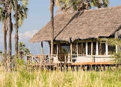 Thatched roof cabin in the coastal nature of Tanzania.